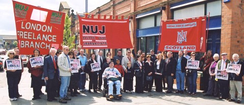 NUJ members in Belfast with NUJ LFB, NUJ and NUJ Scotland banners