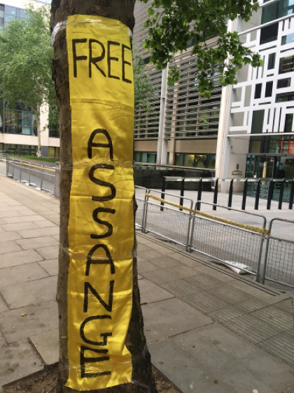 Banner with the words Free Assange