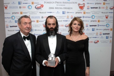 Gabriele Torsello (centre) also known as Kash GT, back in London receiving a Foreign Press Association award