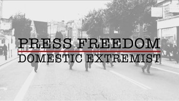 Publicity poster for Domestic Extremist film featuring running riot police; Jason N. Parkinson