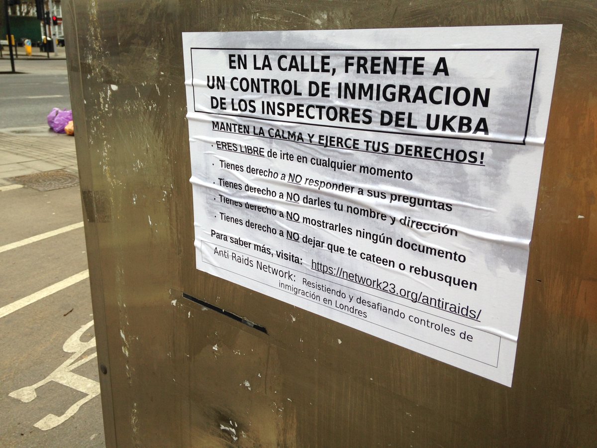 Spanish-language poster warning of raids by immigration officers; Matt Salusbury