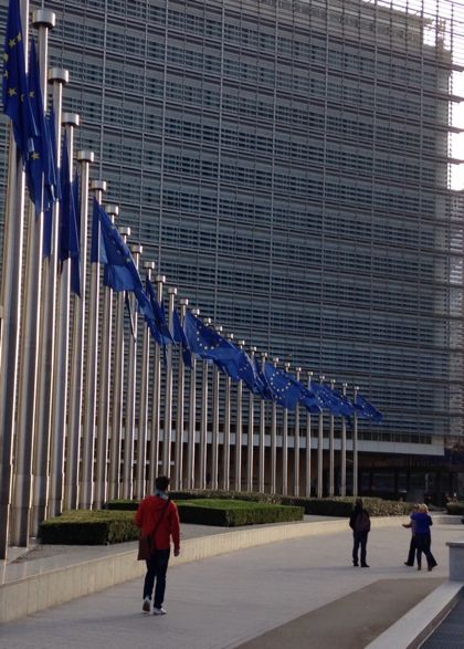 EU flags at the European Commission in Brussels; Photo: Matt Salusbury