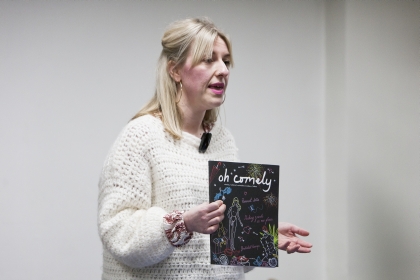 Elizabeth Krohn with a copy of Sabat; photo: Hazel Dunlop