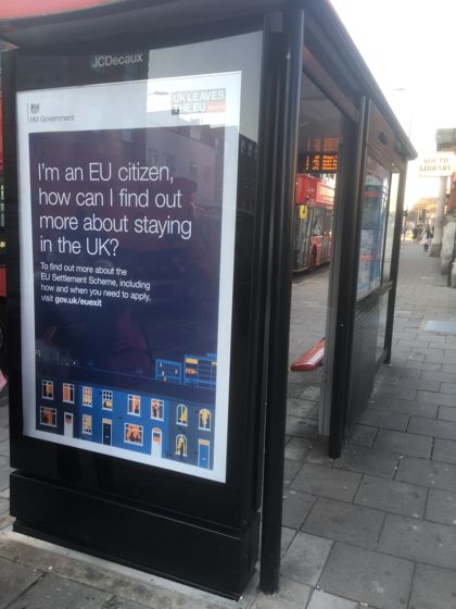EU Settled Status poster on bus shelter