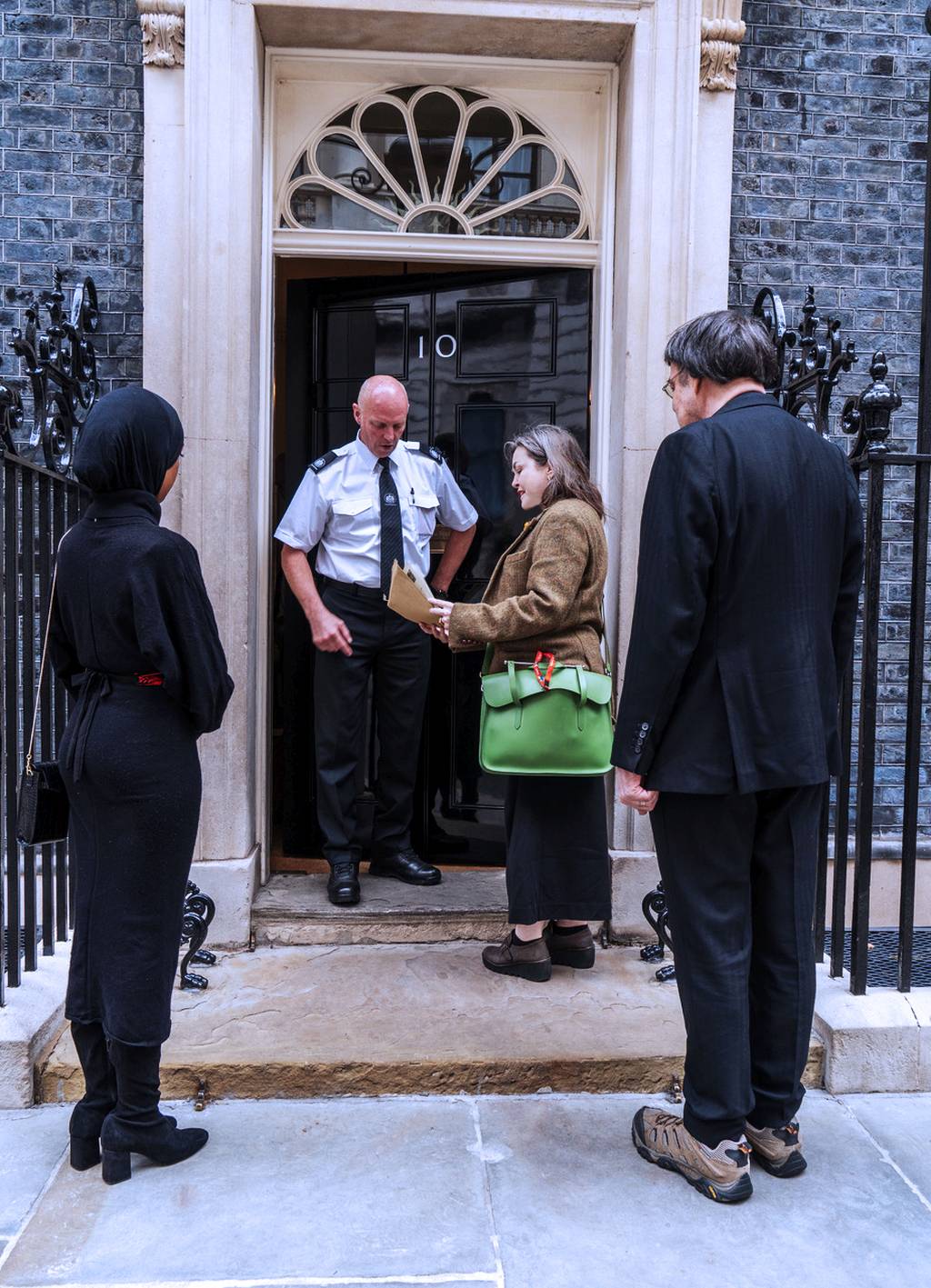 Handing in the letter to 10 Downing Street